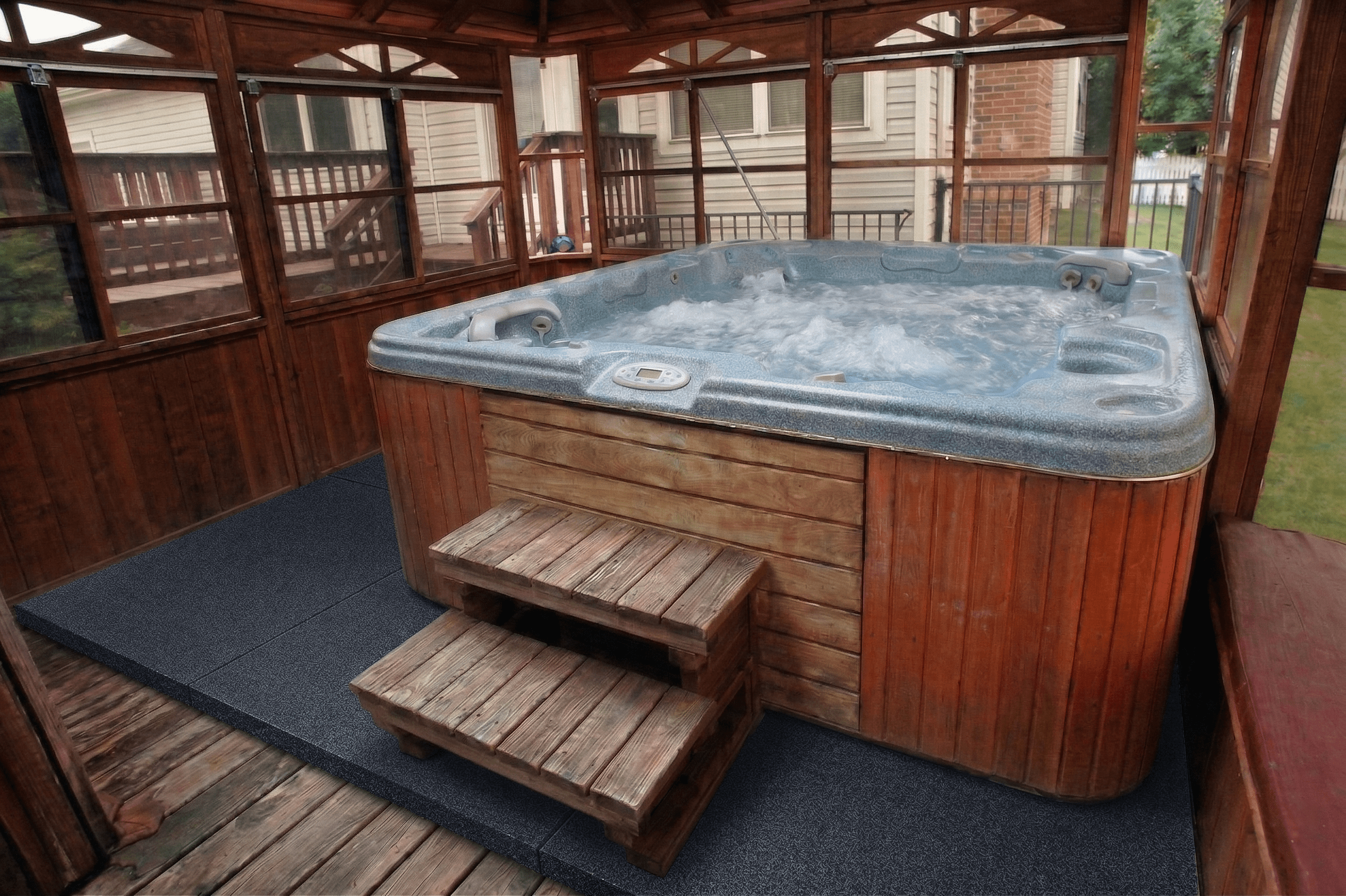 Hot tub and stairs on an 8 by 12 Dragon Pad